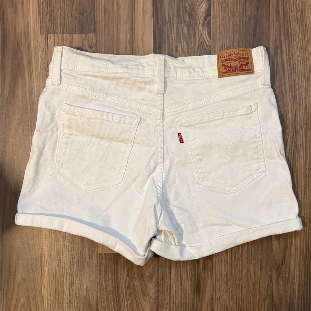 Levi’s White Denim Distressed Shred Mid Length Zip Fly Roll Cuff Shorts 30